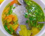 Hình bước làm 5 của món Canh cá dìa nấu thơm cà chua