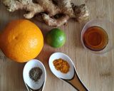 A picture of step 2 of "Immunity Boosting Orange Shot".