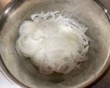 A picture of step 1 of Onion and Crab Sticks Salad.