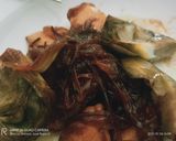 Foto del paso 8 de la receta: Calamarcitos con cebolla caramelizada 🧅 y alcachofas confitadas