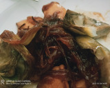 Foto del paso 8 de la receta: Calamarcitos con cebolla caramelizada 🧅 y alcachofas confitadas