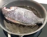 A picture of step 3 of Seasoned Glutinous Rice with Fried Tilapia.