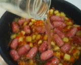 Foto del paso 3 de la receta: Salchichas frescas con patatas y pimientos