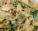 A picture of step 10 of Pappadelle Pasta with Asparagus, Saffron + Peas.