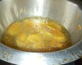 A picture of step 2 of Bhajia with tumeric spice.