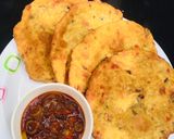 A picture of step 4 of Patheera with onion sauce.