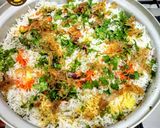 A picture of step 11 of Delhi's layered chicken Dum Biryani.