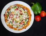 A picture of step 4 of Veg Cheesy Pizza.