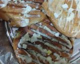 A picture of step 5 of Cheesy egg panini.