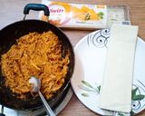 A picture of step 3 of Makhni chicken parcel.