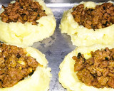 Foto del paso 4 de la receta: Papa rellena con carne molida y lomo embuchado, gratinada con queso