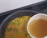 Foto del paso 3 de la receta: Arroz integral de cigalitas con fondo de restos pescado asado