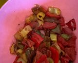 A picture of step 2 of Eggplant peppers and tomatoes.