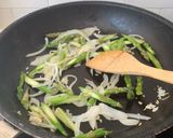 A picture of step 2 of Scrambled eggs with Asparagus with Fontina, Gruyere and Gouda cheese.