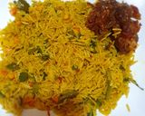 A picture of step 14 of Nigerian fried rice.