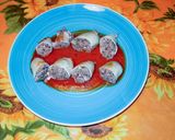 Foto del passaggio 8 della ricetta Calamari ripieni di salsiccia con salsa piccante