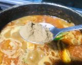 A picture of step 7 of Fish curry.