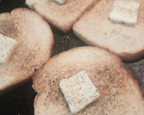 A picture of step 2 of Toast with Butter and Black Pepper.
