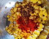 A picture of step 1 of Crispy Corn 🌽 with fried Garlic 🧄.