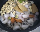 A picture of step 1 of Shahi paneer with white gravy.