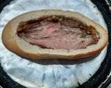 Foto del paso 4 de la receta: Volcán de pan con queso y algo más