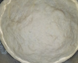 A picture of step 3 of Triangle shaped stuffed bread.
