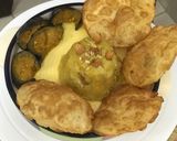 A picture of step 10 of Simple Navratri Thali: Puri, Begun Bhaja & Halwa.
