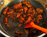 A picture of step 13 of Sweet and Spicy Orange Chicken.