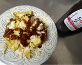 A picture of step 3 of Fried Potatoes with cheese and Japanese sauce.