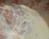 A picture of step 5 of Malpua in kesar pista milk.