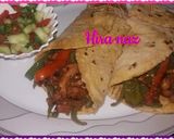 A picture of step 5 of Maxican chicken fajitas With tortillas.
