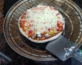 A picture of step 2 of Veg pizza.