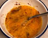 A picture of step 1 of Paprika eggs. Turmeric Sourdough. Black pudding crumb. Smashed avocado.