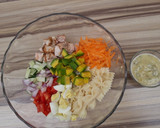 A picture of step 1 of Macaroni and Chicken Salad.