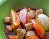 A picture of step 5 of Gulai Telur Ayam & Tomat / Indonesian Chicken Egg & Tomato Curry.