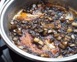 Foto del paso 3 de la receta: Arroz con conserva de chipirones rellenos, en su tinta