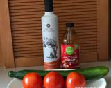 A picture of step 1 of Cucumber and Tomato Vinaigrette Salad.