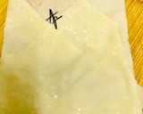 A picture of step 2 of Chicken spring roll wrappers.