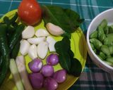 Foto langkah ke 1 dari resep Oseng Cumi Pete Lombok Ijo.