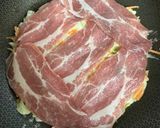 A picture of step 2 of Okonomiyaki with Sauce.