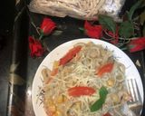 A picture of step 4 of Linguine white sauce pasta.