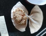 A picture of step 9 of Bhetki Hummus Shell Puff.