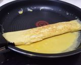 Une image de l'étape 11 de Tamagoyaki (omelette japonaise sucrée).