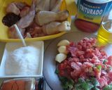 Foto del paso 1 de la receta: Conejo y pollo con tomate a leña