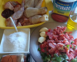 Foto del paso 1 de la receta: Conejo y pollo con tomate a leña