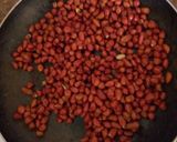 A picture of step 2 of Roasted ground nuts in a salted pan.