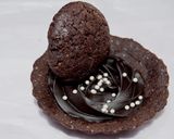 A picture of step 11 of Eggless Chocolate Tart with chocolate filling.