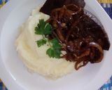 A picture of step 2 of Ox Liver severed with Whipped buttery Mashed Potatoes.