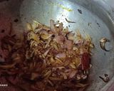 A picture of step 3 of Soya and matar pulav.