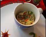 A picture of step 8 of #EggRecipe Microwaved omelette in a coffee mug.